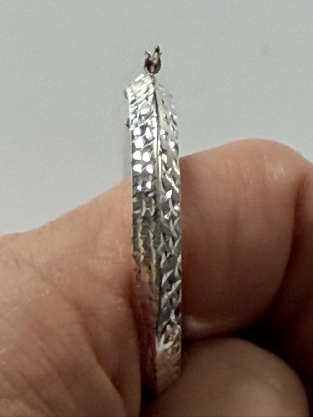 Macy’s Fine Jewelry Silver Tone Textured Oval Hoop Earrings - Picture 3 of 5